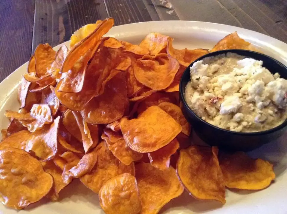 House-made sweet potato chips topped with pulled meat and blue cheese at Killian's in Spearfish, SD